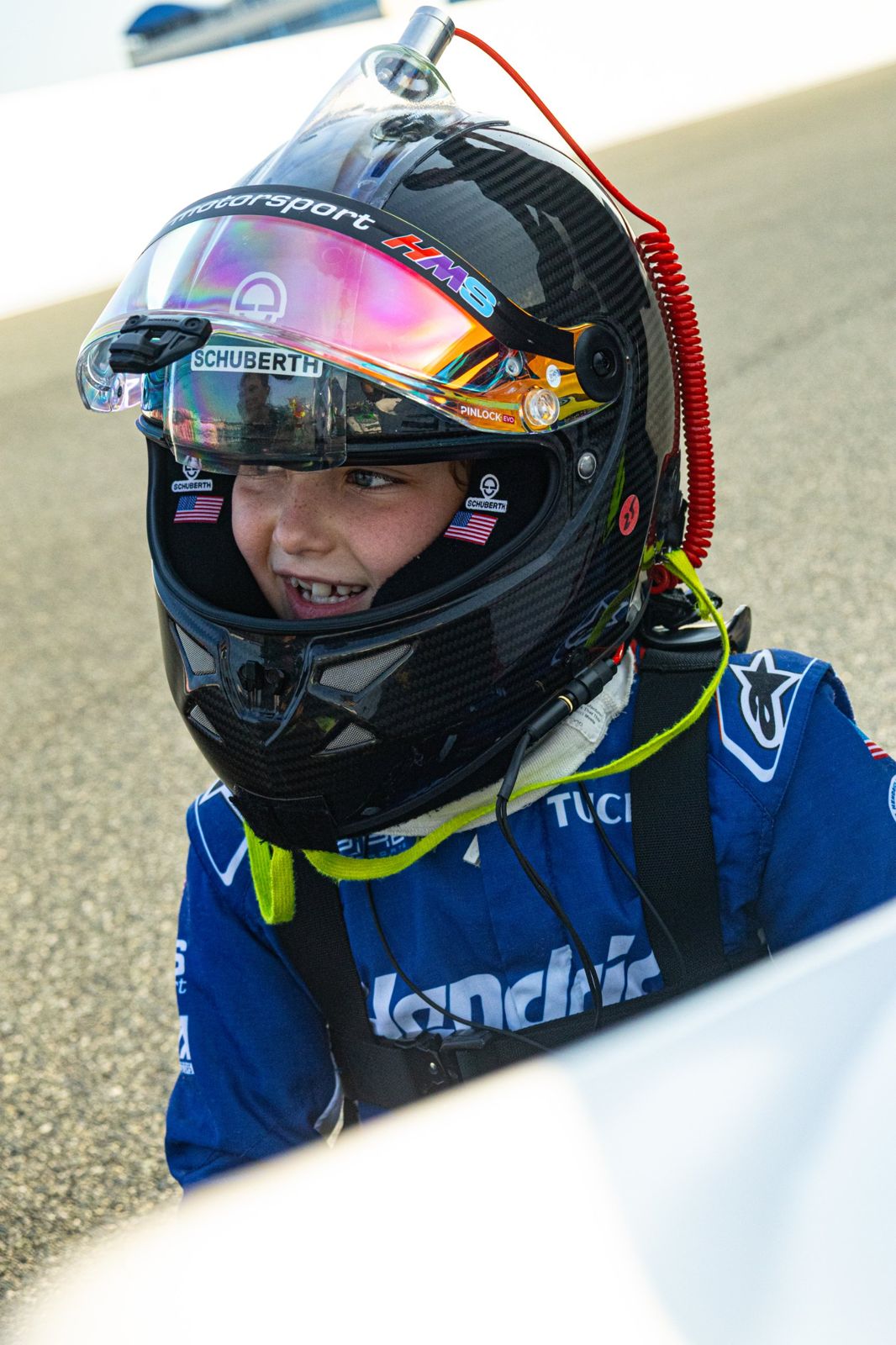 Kip laughing inside his helmet on pit road